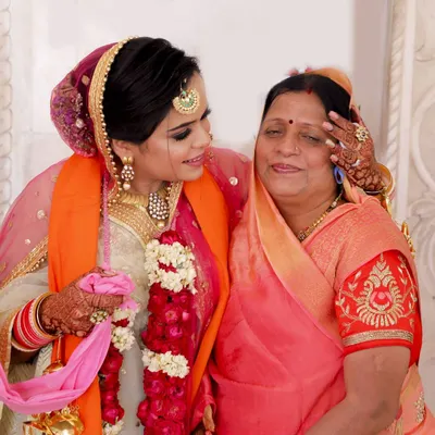A wedding is a deeply emotional day for family. This candid photo captures a tender moment between the bride and her mother, sharing a look of love and pride. These are the quiet, heartfelt interactions I strive to preserve forever.
