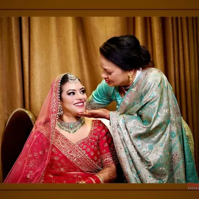 The bond between a mother and her daughter on a wedding day is truly special. We make sure to capture these quiet, emotional interactions amidst the day's celebrations, preserving the heartfelt connection in a timeless portrait.