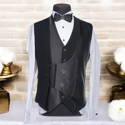This custom double-layered waistcoat showcases my commitment to innovative design. It features an asymmetrical cut, satin lapels, and a decorative chain, crafted to be a distinctive centerpiece of a formal outfit.