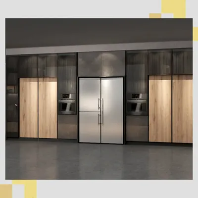 This is how we achieve a seamless and integrated kitchen design. The full-height cabinetry conceals appliances and storage, blending wood grain textures with modern fluted glass and a statement stainless steel refrigerator for a clean, uncluttered look.
