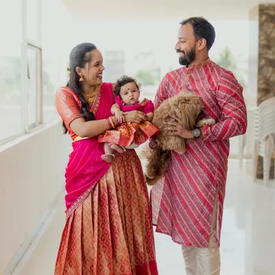A heartwarming family portrait that truly includes everyone. The way this family holds their newborn and their beloved dog shows the love that fills their home.
