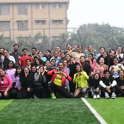 A large group photo capturing the happy and energized participants of our corporate Zumba event. This shows our ability to engage large crowds and create a positive, memorable experience for employees.