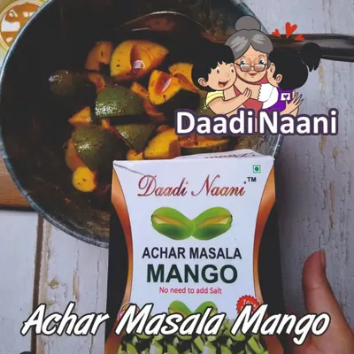 My Achar Masala Mango mix is the key to creating this beautiful, traditional mango pickle. The product packet is shown alongside the final, tempting result in a kadai.