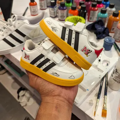 A cute little pair of Adidas I customized live at an event, with simple Mickey Mouse ear doodles and the kid's initials.