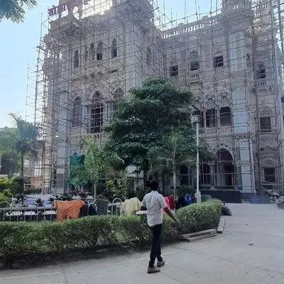 The historic Solapur municipal building, covered in scaffolding during our installation. This project required a lighting solution that could both illuminate the façade and offer dynamic color changes for special occasions.