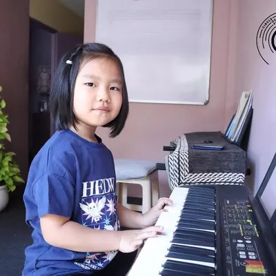 Faith's fingers dance across the keys, weaving magic and melody. We start our youngest students with fun exercises to build their confidence and love for the piano.