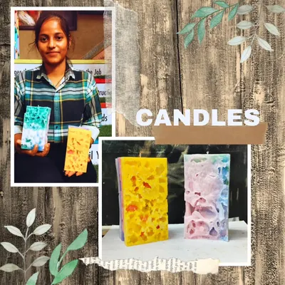 A student showcasing her unique "ice candles." In our candle-making workshops, we explore various creative techniques to make one-of-a-kind decorative pieces.