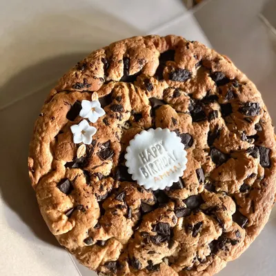 One of the most comforting items on my menu is this giant, buttery chocolate chunk cookie cake! It's best served slightly warm so the chocolate gets all melty and gooey.