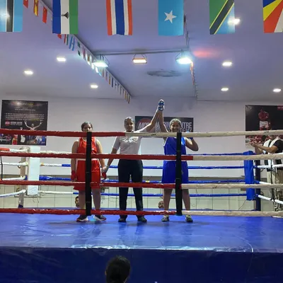 A proud moment for our academy as our boxer stands victorious in the ring. This is a testament to her dedication and the effectiveness of our training methods for competitive female boxers.