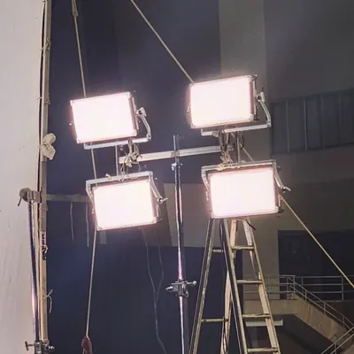 A rig of four Creamsource Vortex 8 panels mounted on a triple header and a Kupo crankovator stand. This is a quick and effective way to create a powerful, soft source that can be easily positioned on set.