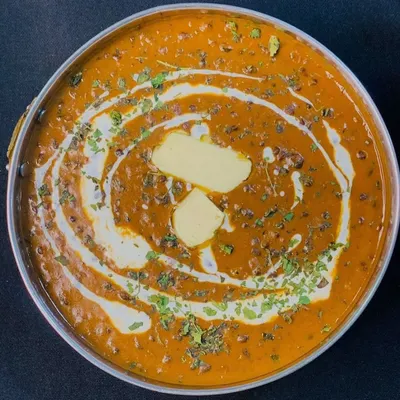 My Dal Makhni is a true crowd-pleaser, slow-cooked to perfection for a rich and creamy texture. It's topped with a dollop of butter and fresh cream, making it a must-have for any North Indian vegetarian catering menu in Gurgaon.