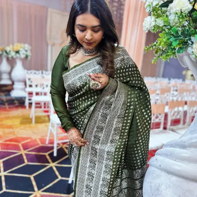 Here I am, wearing my maa's wedding saree from 35 years ago. It’s a beautiful handloom piece, and styling it with a modern choker and simple hair gives it a fresh feel while honoring its timeless beauty.