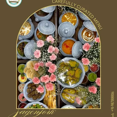 My food platters are carefully curated and beautifully presented, often with a touch of fresh flowers. This image showcases a large order ready for gifting, highlighting the love and flavor I pack into every box.