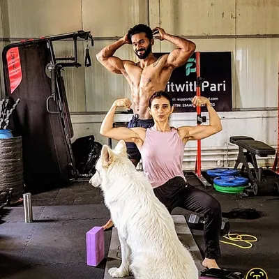 Post-workout flex with my gym bros! My husband and my dog, Skye, are my biggest supporters and the best workout partners a girl could ask for.