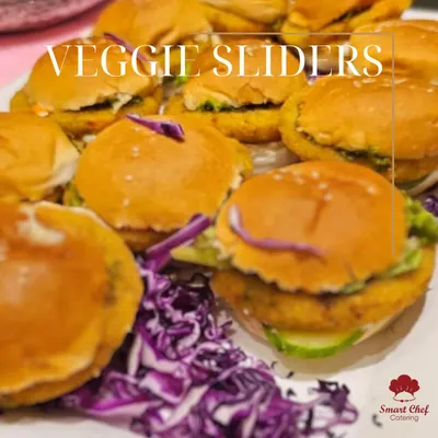 Our classic veggie sliders are a healthy and delightful bite. Packed with a fresh vegetable patty and served on a soft bun, they are a favorite appetizer for all ages.