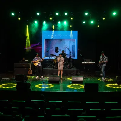 A wide view of the stage during a performance at Muscape 2024. I am experienced in managing the flow of a packed schedule at music festivals, ensuring seamless transitions between different artists and segments.