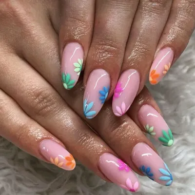 This detailed floral nail art shows my precision with fine lines and color blending. Each flower is hand-painted, creating a unique and artistic design on every nail.