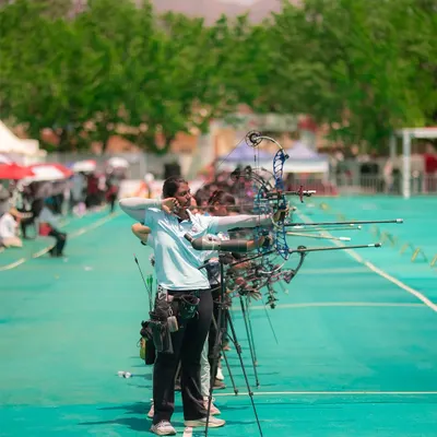 A female archer takes aim at the National Women's Archery Tournament in Ambaji. A powerful shot from my collaboration with Gujarat Tourism.