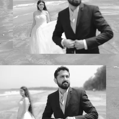 A black and white pre-wedding shoot on the beach. The composition creates a narrative, with the groom in the foreground and the bride approaching, telling a story of anticipation and love.