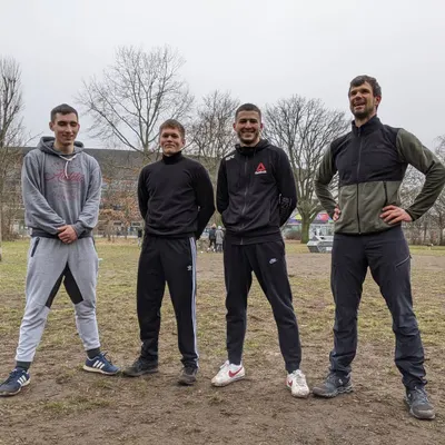 The crew posing after a wrestling practice at the park. We reviewed bicep ties, arm drags, and low-impact takedowns.