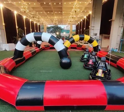 We provide a full Go-Karting experience with an inflatable track and multiple electric karts. This setup is perfect for larger spaces and provides safe, high-speed fun for kids and teens.