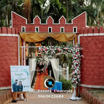 A truly grand entrance designed to look like a castle. This unique and impressive structure, complete with a floral archway, sets a fairytale tone for the wedding from the moment guests arrive.