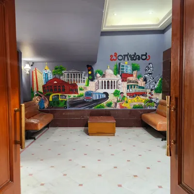 A wide shot of our Bengaluru collage mural in the waiting area for Luxar, creating an impressive welcome for visitors.
