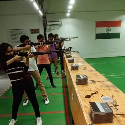 A full line of shooters taking aim with air rifles. I make sure everyone learns the correct posture and handling to get the most out of their 20 rounds.