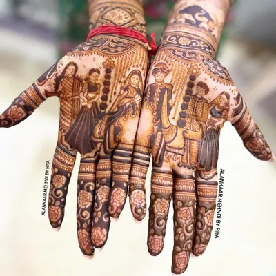 This custom bridal mehndi tells a story, with figures of the bride's family on one hand and the groom's family on the other, celebrating the union of two families.