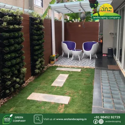 A duplicate of media ID 5. This project showcases a complete courtyard makeover. We integrated vertical gardens with a manicured lawn, stone pathways, and a covered seating area to create a private, functional, and serene urban oasis for our client.