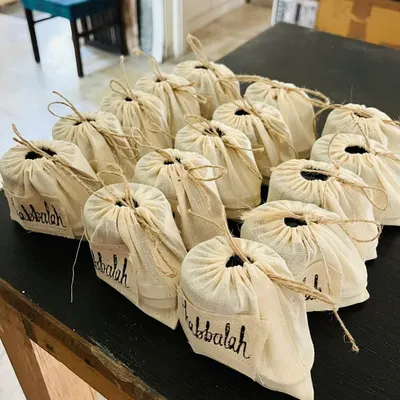 A large order of my handmade products ready for a corporate event. Each item is individually packed in an eco-friendly cloth pouch, showing that even bulk orders have a personal, handcrafted touch.
