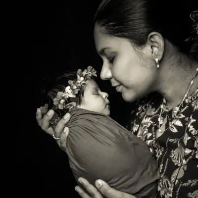 A mother's love, captured in a timeless black and white portrait. I love how this style strips away all distractions, focusing purely on the emotion and connection.