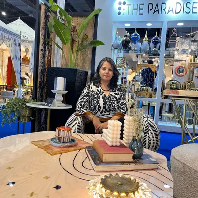At our furniture extravaganza, ready to welcome visitors. Events like these are a whirlwind of creativity and craftsmanship, where I get to unveil stunning new collections that speak volumes without saying a word.