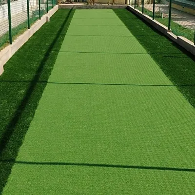 This dedicated cricket practice pitch is laid with our specialized sports turf. It is designed to provide a true and reliable bounce for batsmen and withstand the impact of fast bowlers, ensuring a high-quality practice experience.