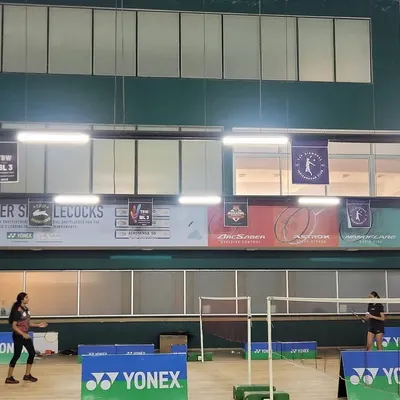 A view of our courts during the Indranagar Badminton League. The academy is always buzzing with competitive energy, which helps all our players improve.