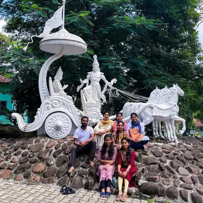 With my first batch of HITYOGA students at the S-VYASA campus, sitting before a beautiful sculpture of Krishna and Arjuna. This is where it all began.