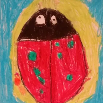 This ladybug drawing by a preschooler demonstrates how we teach basic shapes like ovals and circles. There is a clear logic to our method, even for the youngest artists.