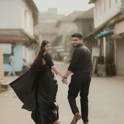 A classic "follow me" shot, leading the way through a charming old-world street. This style of photo is perfect for telling the story of your journey together.