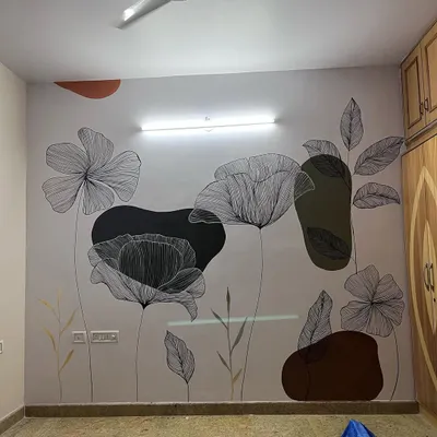 This bohemian foliage mural is a milestone piece for me. The combination of black line art flowers with abstract shapes in earthy tones creates a balanced and artistic composition.