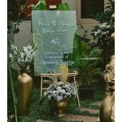 A classic and elegant welcome sign for a vintage-themed engagement party.