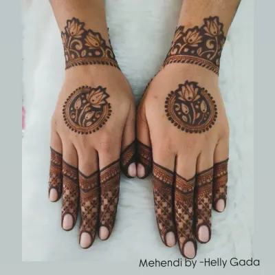 A modern and symmetrical back-hand design. Each hand features a central lotus mandala with detailed finger work and a matching lotus cuff, creating a clean and balanced aesthetic.