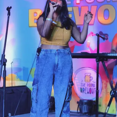 On stage at The Poona Brewout, lost in the music. This is the full band experience, where we create a big sound for a big crowd.