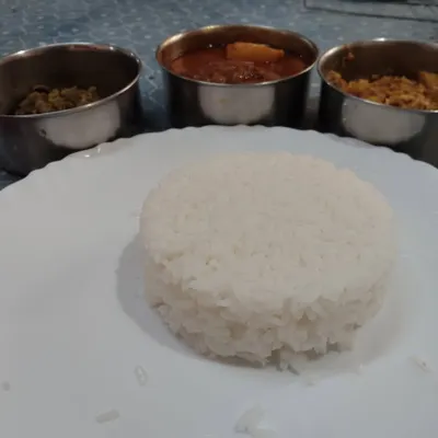 Craving a homestyle non-veg lunch? Our meal plate includes freshly steamed rice with a selection of curries and vegetable sides, all cooked with less oil and authentic spices.