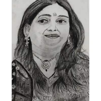 This detailed charcoal portrait was created by one of our talented students. Our portrait classes focus on capturing likeness and expression through careful shading and line work.