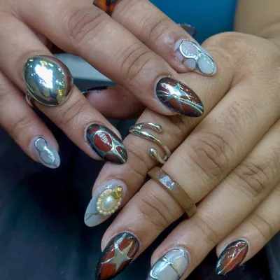 A bold, mixed-media design with stars, metallic accents, and a 3D pearl. This set is full of personality and artistic details.