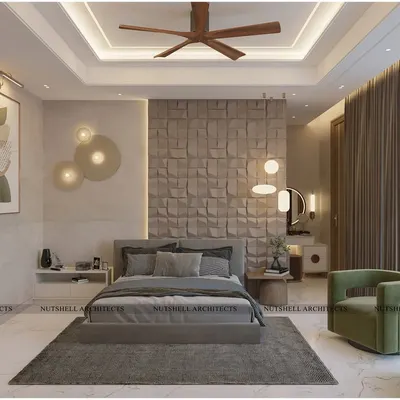 This guest bedroom is a symphony of textures. The focal point is the custom CNC-cut stone panel behind the bed, which adds sculptural drama. We used a neutral palette and layered lighting to create a cozy yet sophisticated atmosphere.