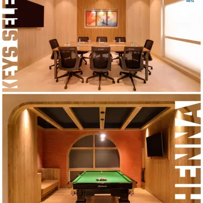 We design spaces that balance work and leisure. This project features a formal, wood-paneled conference room for focused meetings, alongside a dedicated recreational area with a pool table, demonstrating our ability to create multifaceted commercial environments.