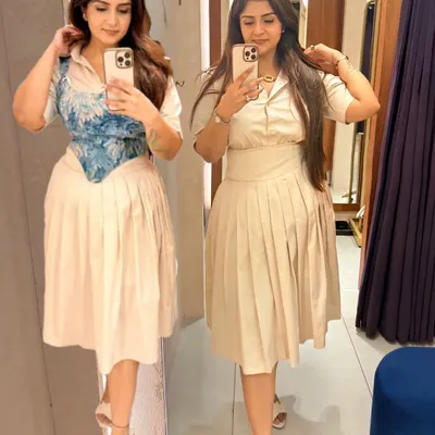 See the difference between simply wearing an outfit and styling it with intention. On the right, a minimal beige co-ord set. On the left, the same set is instantly elevated with a blue jacquard corset, changing the entire vibe.