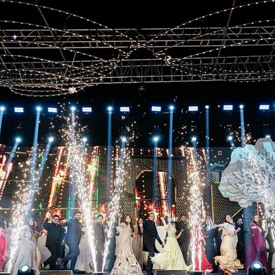 The grand finale of the sangeet, with the entire family on stage. We ended the night with a bang, using cold pyros and a full cast of performers to create an electrifying final memory.