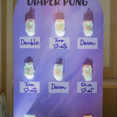 Who says baby showers can't have a little friendly competition? This 'Diaper Pong' game station is always a huge hit, bringing so much laughter and energy to the party. I handle the entire setup for you.